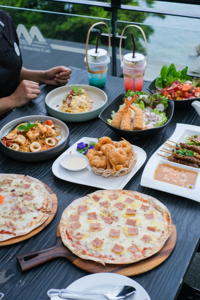 Interior of Khanom Beach Mountain Seafood & Beach Cafe — elegant dining room with natural lighting